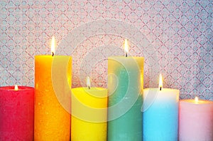 Burning Candles In Pastel Colors