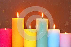 Burning Candles In Pastel Colors