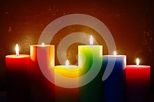 Burning Candles In Rainbow Colors