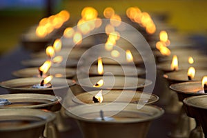 Burning candles in a temple