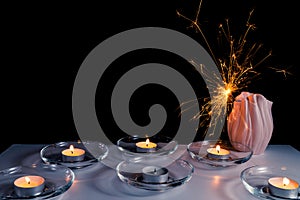 Burning candles on a white background next to the fireworks. Obon festival. Diwali festival