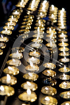 Burning candles in Worcester Cathedral - United Kingdom