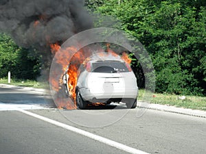 Burning car on highway