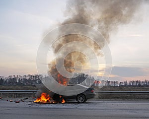 Burning Car on the Road