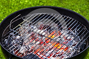 burning charcoal grill