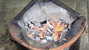 Burning charcoal for grill Glowing embers in hot red color in the stove