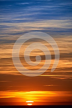 burning clouds in the evening sky