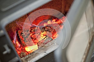 Burning coals of fire wood photo