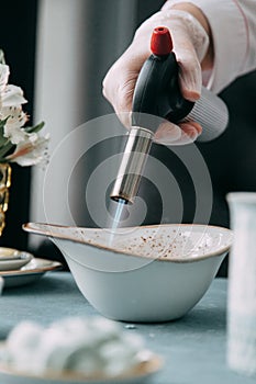 Burning creme brulee with coffee photo