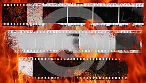 Burning and damaged strip of celluloid film