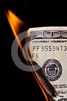 Burning dollar banknote