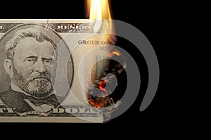 Burning dollar bill