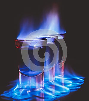 burning drink in shot glass