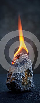 A burning ember symbolizing the urgency of addressing climate change photo