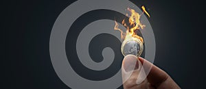 Burning Euro coin on dark background panorama