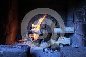 Burning fire in the fireplace
