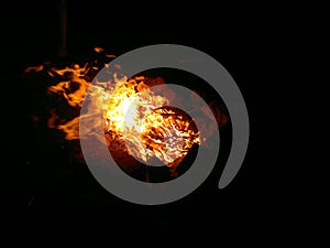 Burning fire in the night symbolizes purification.
