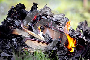 Burning of forbidden books in a totalitarian state