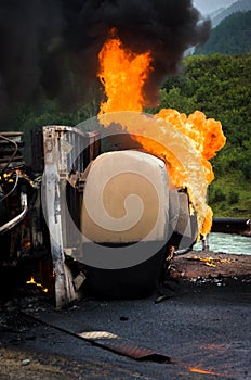 Burning gas tank truck road accident