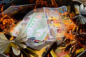 Burning Ghost money paper