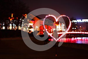 Burning Heart on the Street at Night. Love, Valentine`s Day