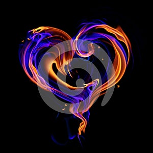 Burning heart symbol isolated on black background