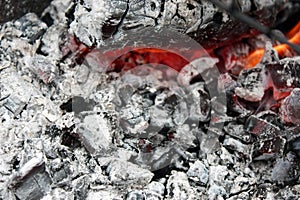 burning hot coal in the grill close up