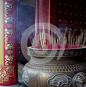 Burning Incense In Big Brass Cauldron