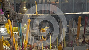 Burning incense and candles in Bangkok, Thailand