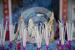Burning incense joss sticks