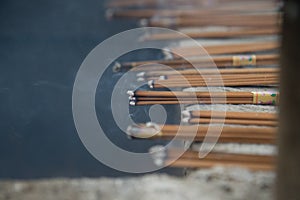 Burning Incense and Smoke in Close-up Focus