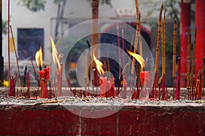 The burning of incense in the temple