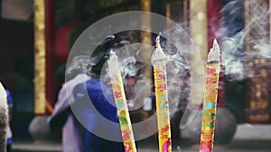 Burning incense in  traditional Chinese Buddhist temple