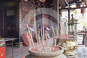 Burning Joss Sticks at Chinese Temple