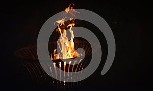 Burning logs in firepit great background photo