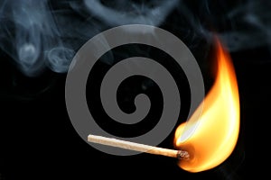 Burning match and smoke