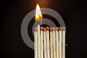 Burning matches on a black background