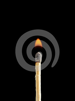 Burning matches closeup isolated on a black