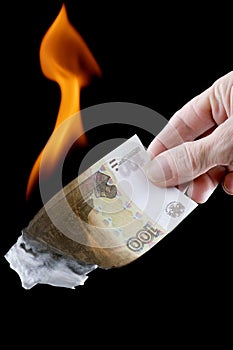 Burning money