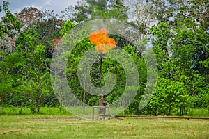 Burning oil gas flare near Limoncocha National Park in the Amazon rainforest in Ecuador