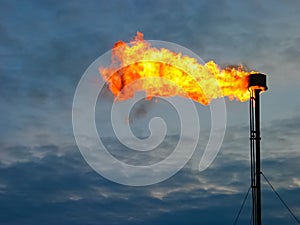 Burning oil gas flare photo