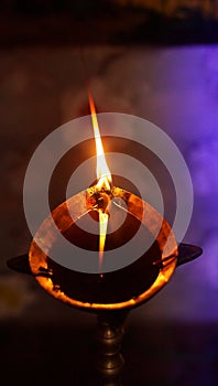 A Burning Oil Lamp in a Namghar in the Indian State of Assam