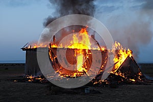 Burning old abandoned house