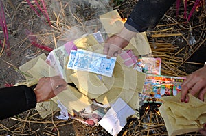 Burning paper money