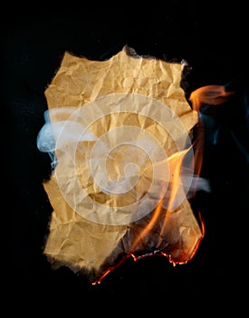 Burning piece of crumpled paper