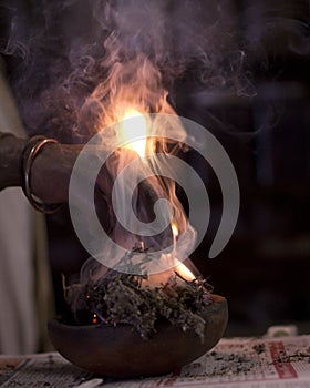Burning plant material in traditional medicine