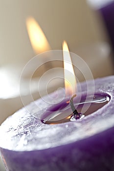 Burning purple candle