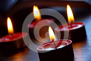 Burning red candles for backgrounds
