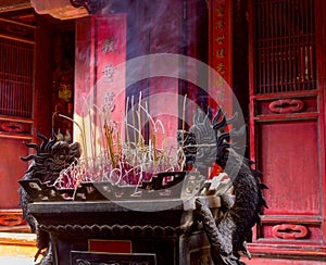Burning red chinese candle in temple