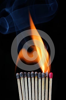 Burning row of matches